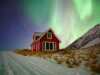 hut with northern lights